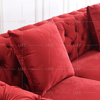 Modernes Sofa aus getuftetem Stoff mit goldenen Beinen